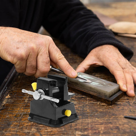 Mini Bench Vise Suction Clamp For Tabletop Workholding Portable Desk Carving Jewelry And Model Making Vise shown with hands in use