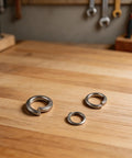 Open Spring Washers And Split Lock Washer Set, 480 Pcs Mechanical Fastener Kit, 304 Stainless Steel washers on wooden surface