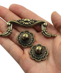 Vintage Drop Bail Cabinet Pulls 3 Inch Hole Centers 6 Piece Set Antique Bronze Finish in hand, showing details and design.