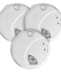 Three Top Shelf Battery Operated Combination Smoke And Carbon Monoxide Alarms in white, designed for wall install, featuring test button.