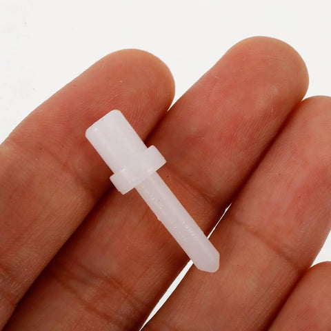 Top Tier Shutter Repair Pins Kit Featuring Heavy Duty Push Pin Clips For Window Louver And Shutter Hardware Replacement. White plastic push pin held in hand.
