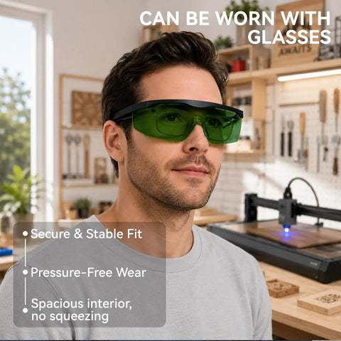 Heavy Duty Blue Laser Safety Glasses With OD4 Plus Lens Block 400nm To 500nm Wavelengths For Engraving Workbenches And DIY Crews In Matte Black Frames shown worn over regular glasses for added protection.