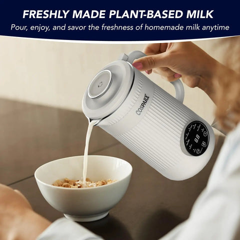 Person pouring milk from 8 In 1 Nut Milk Maker Blender 32oz Capacity For Creamy Soy Almond Oat Coconut And Plant Based Non Dairy Beverages With Delay Start And Keep Warm For Easy Homemade Milks into a bowl of cereal