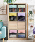 Total Game Changer Storage Bins With Clear View Panels, Foldable Pop Up Organizers, 13 Inch Pastel Multi Color set in a shelving unit.