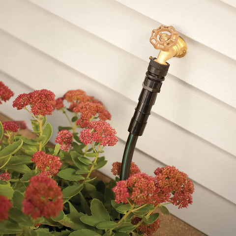 HT075BFFSX Pro Grade Drip Irrigation Backflow Preventer With 150 Mesh Filter installed on outdoor hose for garden use