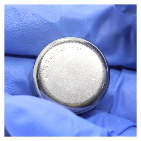 Top Shelf Needle Bearings 12X18X12mm 10 Pack Drawn Cup Roller Bearings Pre Lubricated metallic surface in gloved hand.