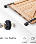 Close-up of J pulleys and heavy-duty ball rollers on 12 Foot Sliding Barn Door Hardware Track Kit with matte black finish.