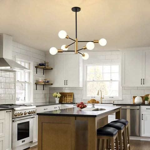 Dope Black And Gold 6 Light Sputnik Chandelier in modern white kitchen above island.