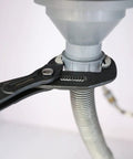 Close-up of Three Piece Quick Release Groove Joint Pliers Set With Adjustable Slip Joint Pliers gripping a pipe connection