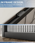 Hardcore Interior Sliding Barn Door Featuring Textured Reeded Glass Panels And Matte Black Frame Hidden Wall Track Kit Saves Wall Space And Moves Like Butter In Any Room Setup, close-up of slim aluminum frame design.