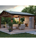 Slick Modern Cylindrical LED Outdoor Wall Lantern In Antique Bronze Featuring Smooth Minimalist Lines And Top Shelf Glow Designed For Covered Patios Decks Porches And Garages Seeking A Straight Up Style Upgrade in a cozy patio setting.