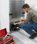Man using Heavy Duty Appliance Sliders With Reinforced Pull Straps For Absolute No Sweat Fridge Moves on a refrigerator.
