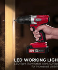 Heavy Duty 20 Volt Max Lithium Ion Cordless Drill Kit featuring ergonomic grip and keyless chuck in hand drilling into wood.