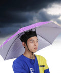 Person wearing Raindrops Purple Umbrella Hat With Adjustable Fit For Outdoor Vibes, Sun Protection Cap For Camping, Hiking, Gardening, And Beach Days