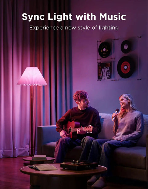 Couple enjoying music with Top Tier Br30 Smart Light Bulbs 850 Lumen E26 Socket 4 Pack RGBWW, colorful ambiance.