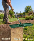 Person using Lawn Leveling Rake 30 By 10 Inch Adjustable Leveler For Yard And Garden Heavy Duty Stainless Steel Handle Easy Dirt And Soil Leveling Tool For Lawn Top Dressing Green on lawn with topsoil, sand, and peat moss.