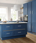 Modern kitchen with blue cabinets featuring 40 Pack Brushed Nickel Stainless Steel Kitchen Cabinet Handles Drawer Pulls, 5 Inch Length With 3 Inch Hole Center.