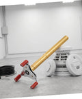 Ladder Free Smoke Sensor Removal Tool With 11 Point Eight Inch Extended Reach Stick next to a smoke detector in a modern setting.