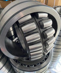 Pro Grade Spherical Roller Bearing 22207cc W33 35x72x23mm showing cylindrical rollers and smooth metal surfaces for durability.