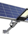 Hella Bright Solar Led Flood Light With Remote And Dusk To Dawn Sensor, featuring solar panel and modern design for outdoor mounting.