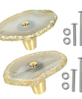 Set Of 4 White Agate Slice Cabinet Knobs With Beautiful Natural Geode Faces And Solid Hardware For Stress Free Kitchen Or Bathroom Drawer Updates That Bring Serious Wow Factor Home. Two knobs shown with brass hardware.