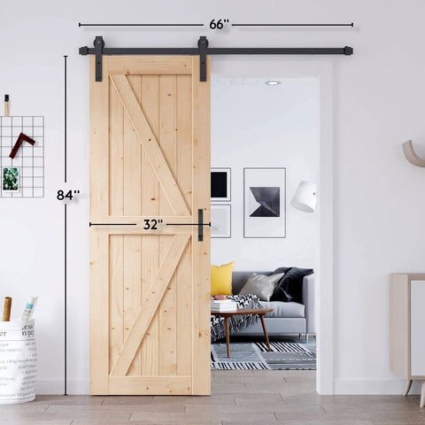 Rock Solid Spruce Sliding Barn Door 32 By 84 Inches displayed with hardware, in a modern living room setting.