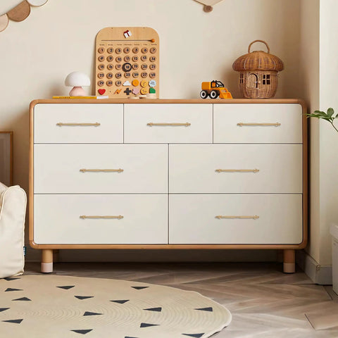 Real Deal Solid Brass Cabinet Pulls With Slick Brushed Gold Finish featured on a stylish dresser with six drawers.