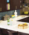 Modern kitchen with Forty Pack Brushed Gold Cabinet Pulls Modern Bar Drawer Handles for kitchen, featuring dark cabinets and white countertop.