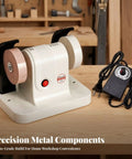 Solid Dual Wheel Bench Grinder And Compact Polishing Rig With Copper Motor Blade Sharpener Tool Honer Built For Hustle Ready Crafters And Clutter Free Garage Workbenches on wooden table.