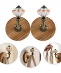 Old School Cool Antique Ceramic Wall Hooks With Rock Solid Wood Base Showstopper Entryway Coat Rack Pair handpainted with multicolor porcelain.
