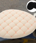 Hella Cozy Beige Plush Motorcycle Seat Cover With Super Warm Winter Fluffy Padding For Riders Seeking A Smooth Ride And Dope Dirt Bike Accessories That Look Clean And Feel Amazing All Day Long close-up view on motorcycle seat.