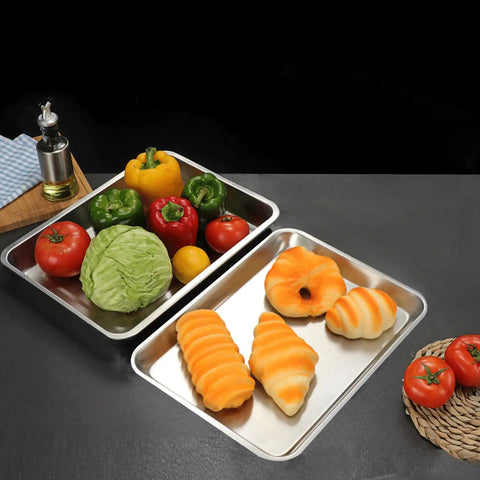 Heavy Duty Commercial 13 X 18 Half Size Aluminum Sheet Pan And Bun Tray With Sturdy Tapered Sides, showcasing colorful vegetables and baked goods.