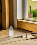 Six Piece Heavy Duty Nylon Barn Door Guide Wheel Pulleys for Streamlined Sliding Track Setup on a workbench with tools.