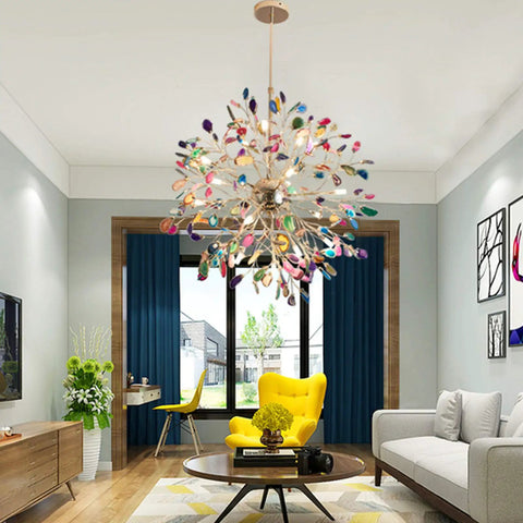 Modern living room with colorful sputnik chandelier, yellow armchair, and blue curtains.