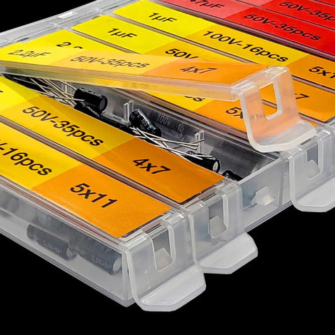 Badass Electrolytic Capacitor Assortment Kit Packing Six Hundred Thirty Three Chips with labeled trays for easy access.