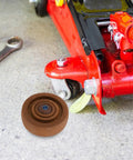 Heavy Duty 4 Inch Nylon Caster Wheel Replacement For Oven Rack And Freezer Cart, High Temperature Roller on a garage floor.