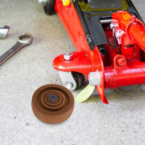 Heavy Duty 4 Inch Nylon Caster Wheel Replacement For Oven Rack And Freezer Cart, High Temperature Roller on a garage floor.