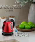 Red One Point Two Liter Cordless Electric Kettle 1500 Watt Fast Boil Stainless Steel Portable Tea Pot on kitchen counter