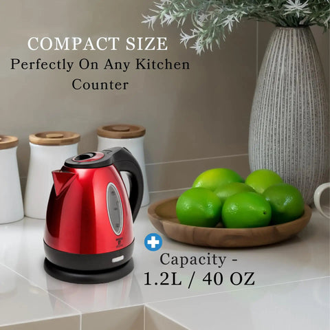Red One Point Two Liter Cordless Electric Kettle 1500 Watt Fast Boil Stainless Steel Portable Tea Pot on kitchen counter