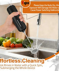 Handheld Milk Frother With Double Whisk Battery Operated Electric Foam Maker being rinsed under a kitchen faucet