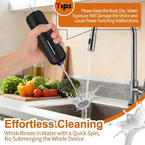 Handheld Milk Frother With Double Whisk Battery Operated Electric Foam Maker being rinsed under a kitchen faucet