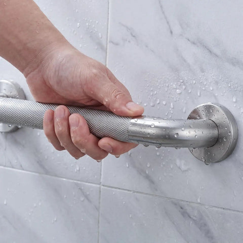 Close-up of a hand gripping the Super Sturdy 24 Inch Stainless Steel Shower Grab Bar That Actually Holds Tight.