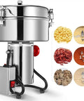 Pro Grade Home Grain Grinder And Powder Mill For Coffee Beans Herbs And Cereals Super Fine Powder Maker 220V, metal body with ingredients.