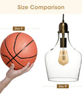Size comparison of basketball and Hand Blown Glass Bell Pendant Light in Gold and Clear, showing 9 Inch Shade diameter.
