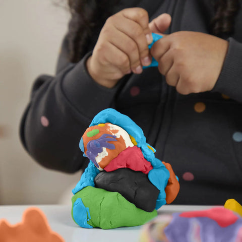 Child sculpting colorful modeling compound, using Forty Two Pack Bulk Mini Modeling Compound Cans For Creative Kids And Rad Little Legends Hella Cool Classroom Prizes Party Favors Back To School Sick Stash Non Toxic Craft Supply Age 2 Plus Vibrant Colors.
