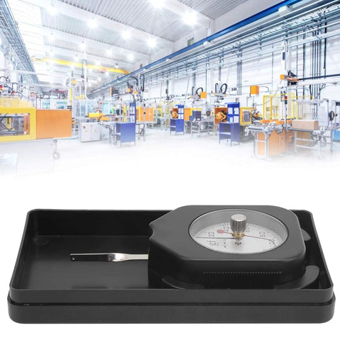 Pocket-Sized Dial Tension Meter Featuring Double Pointer for Rock-Solid Gram Force Testing in a workshop setup.
