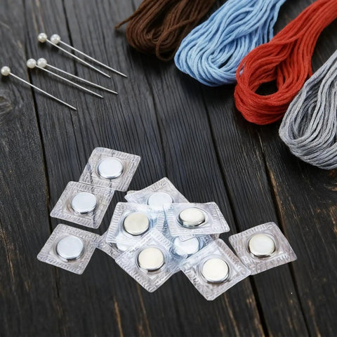 Sixty Four Piece Hidden Sew Magnetic Snap Kit delivers solid hold with PVC sleeves, featuring flat concealed fasteners and sewing supplies.