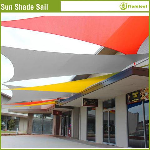16 By 16 Foot Rectangular Waterproof Sun Shade Sail For Outdoor Patio And Backyard UV Blocking Canopy In Light Grey High Density Polyester With PU Coating 97 Percent UV Block Durable Shade For Lawn And Garden displayed above a building.