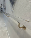 Straight Up Heavy Duty Clear Acrylic Stair Handrail With Solid Gold Wall Mount Brackets Non Slip Interior Banister For Dead Solid Safety On Every Step And Smooth Custom Fits, side view showcasing clear tube and gold brackets.
