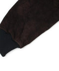 Close-up of a black leather sleeve from a DVALIN Hybrid FR Leather Welding Jacket with ribbed cuff for maximum spark and heat protection.